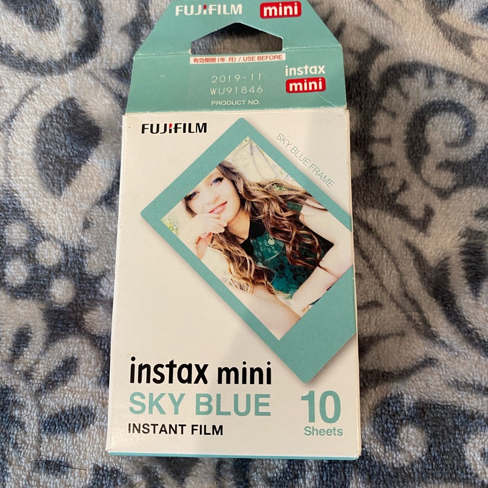 New, unopened Instax mini sky blue instant film